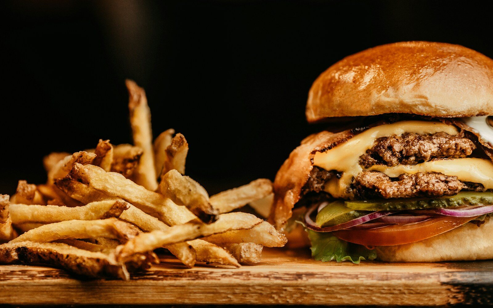 Burger served with French fries