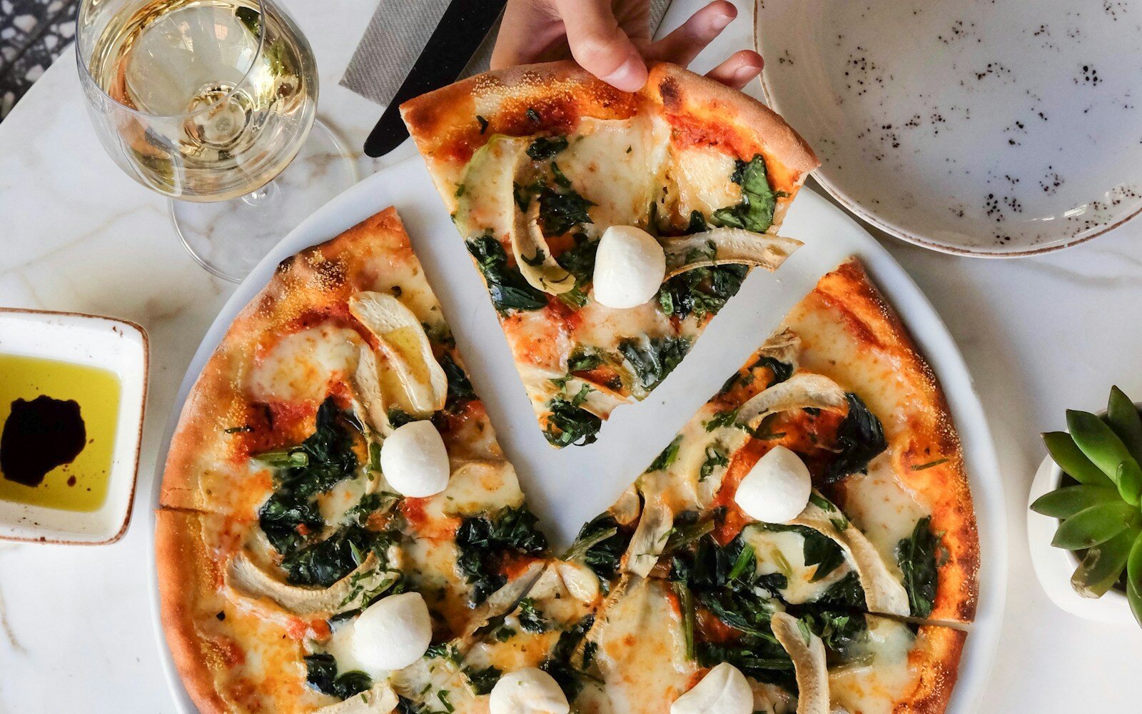 Hot pizza shared at the table